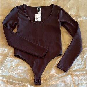 Forever 21 Chocolate Brown Medium Long Sleeve Blouse With A Two Snap Closure.